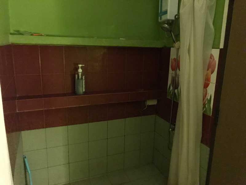 Shower stall inside massage room at Exotic Massage